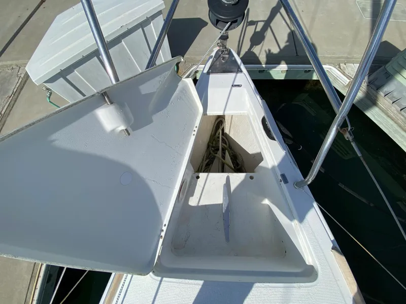 Open anchor locker on a 2004 Beneteau 36.7 sailboat at the dock.