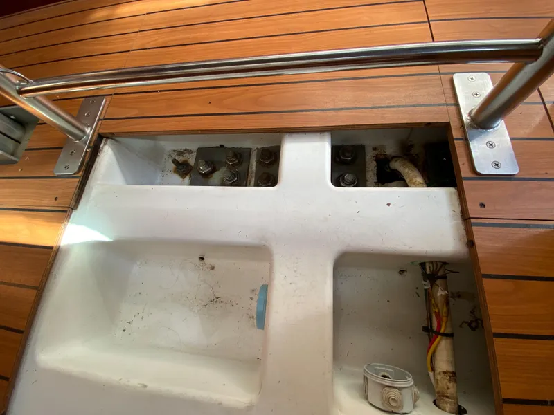 Beneteau 36.7 2004 sailboat deck with open hatch and visible wiring.
