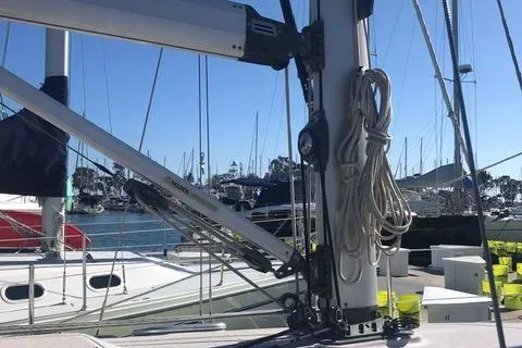 2008 Catalina 320 MkII sailboat mast and rigging in a marina setting.