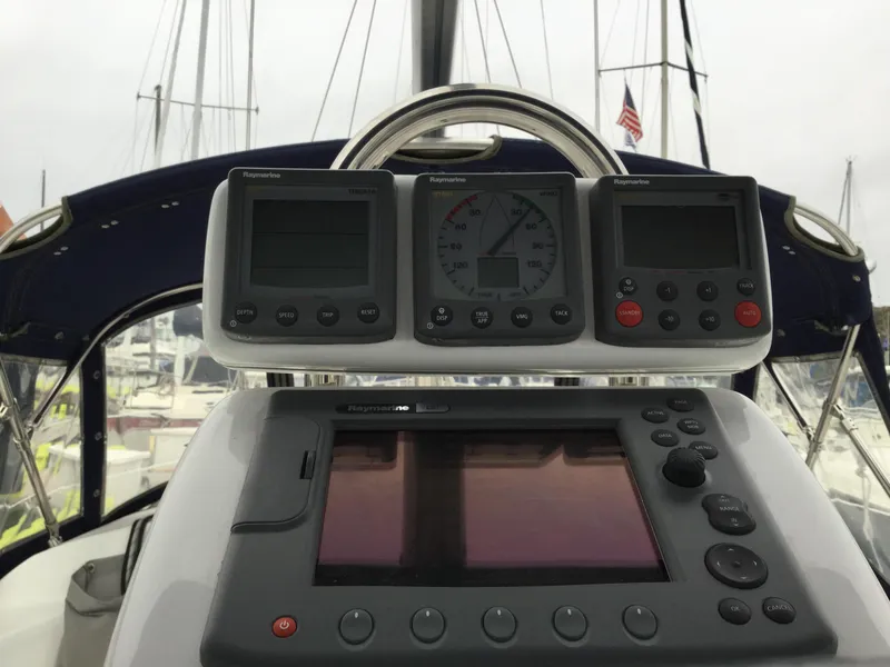 Cockpit of 2008 Catalina 320 MkII sailboat with navigation instruments and controls.