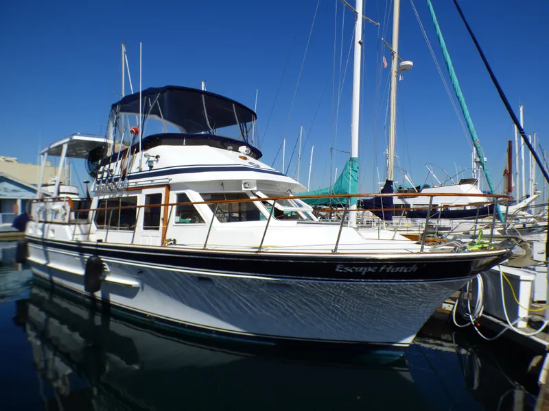 1984 Spindrift 39 ft. Aft Cabin Twin Diesel yacht docked in marina.