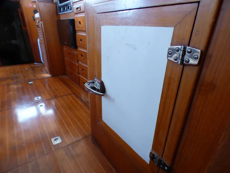 1984 Spindrift 39 ft. Aft Cabin interior with wooden cabinetry and flooring.