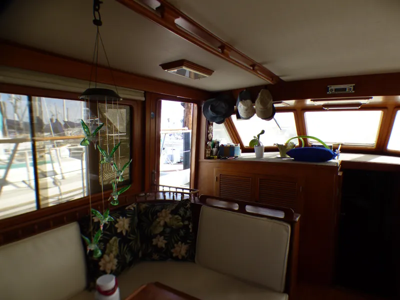Interior of 1984 Spindrift 39 ft. Aft Cabin Twin Diesel yacht with cozy seating area.