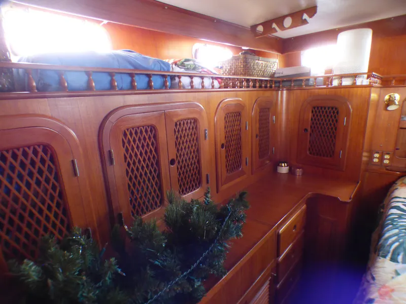 Interior of 1984 Spindrift 39 ft. Aft Cabin, featuring wooden cabinetry and cozy decor.