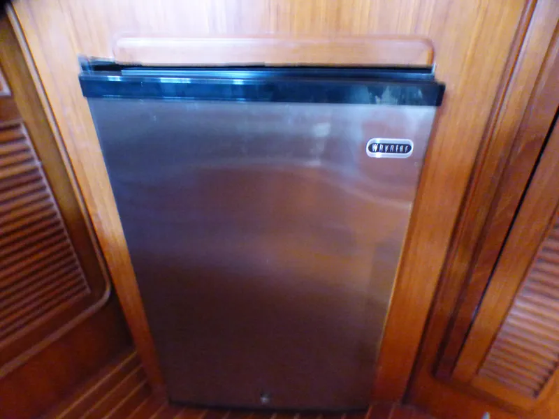 Compact marine refrigerator in a 1984 Spindrift 39 ft. Aft Cabin Twin Diesel yacht.