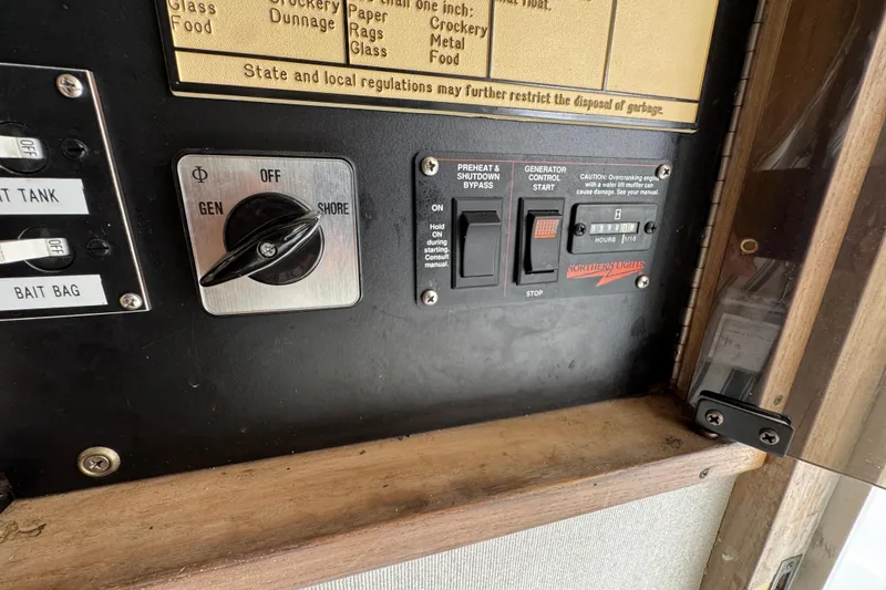 1993 Blackfin Sportfisher control panel with generator and shore power switches.