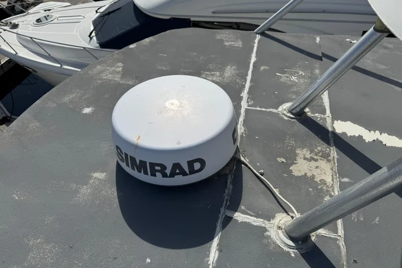Simrad radar on 1993 Blackfin Sportfisher boat deck, showing wear and tear.