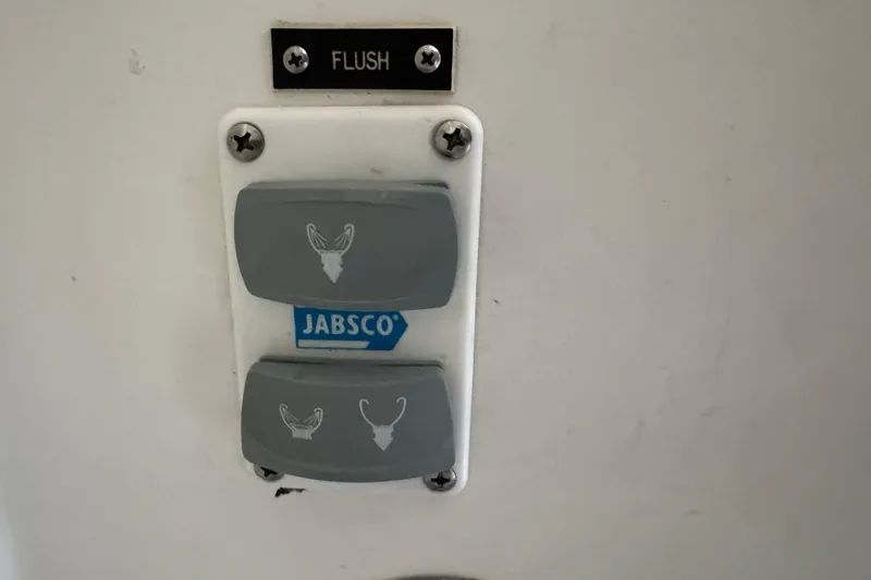 Jabsco marine toilet flush controls on 1993 Blackfin Sportfisher boat.