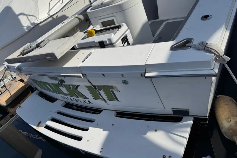 1993 Blackfin Sportfisher boat stern with "Rock It" text, docked in Avalon, CA.