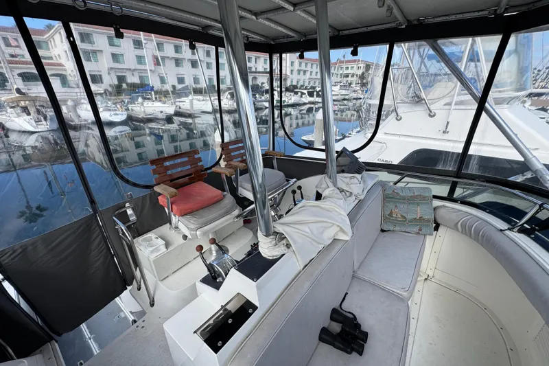 Interior view of a 1993 Blackfin Sportfisher boat docked at a marina.