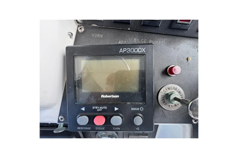 Control panel of a 1993 Blackfin Sportfisher featuring Robertson AP3000X autopilot system.