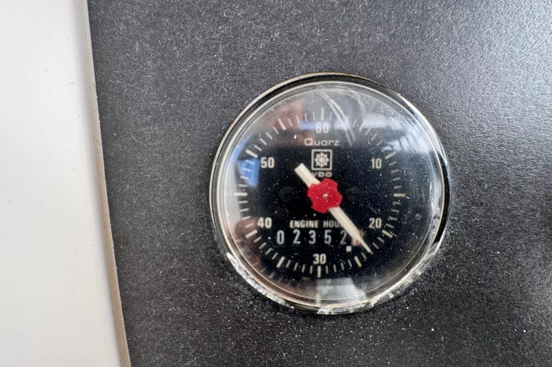 Close-up of a 1993 Blackfin Sportfisher engine hour meter showing 2352 hours.