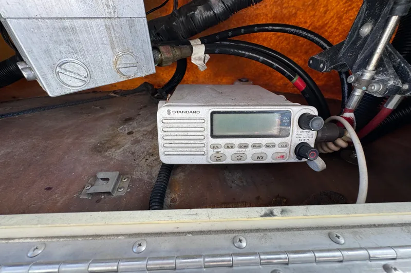 1993 Blackfin Sportfisher radio equipment with wiring and control panel.