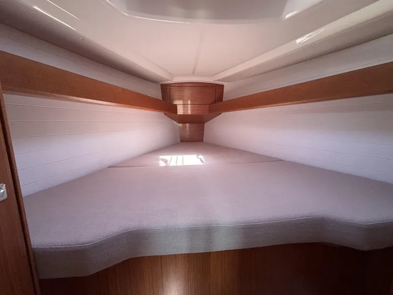 Interior cabin of 2020 Bavaria Cruiser 34 yacht, featuring a cozy sleeping area.