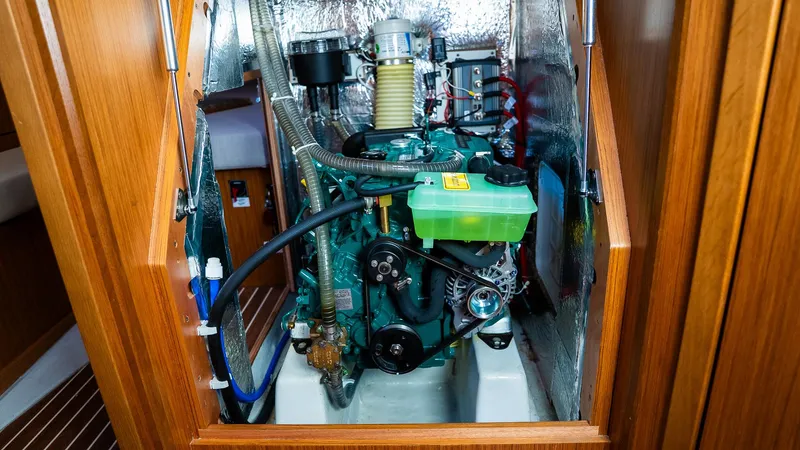 Engine compartment of a 2020 Bavaria Cruiser 34 sailboat, showcasing mechanical components.