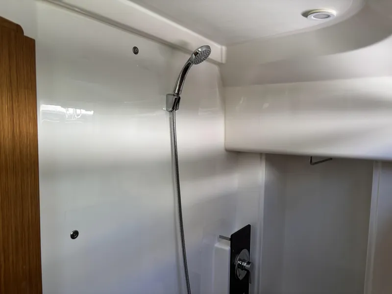 Interior shower of 2020 Bavaria Cruiser 34 yacht, featuring modern fixtures.