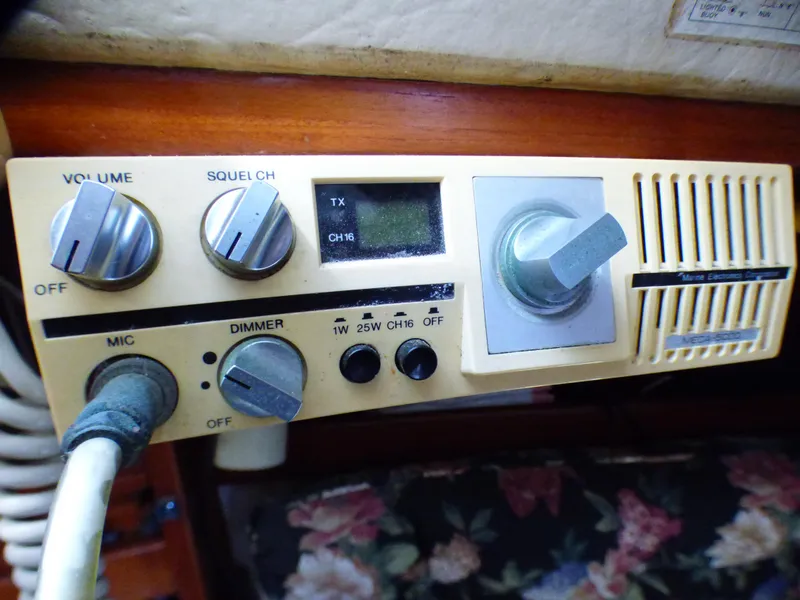 Vintage marine radio controls on a 1982 Catalina 38 sailboat.