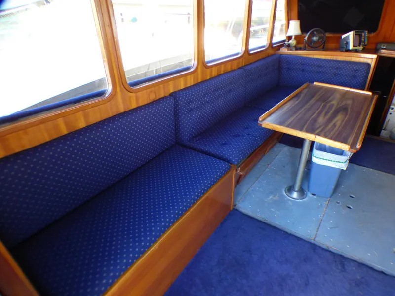 Extended L-Shaped Bench Seating on Port Side of Salon