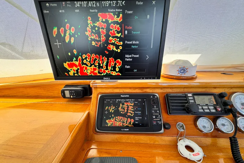 1978 Roughwater 41 boat dashboard with radar and navigation equipment.