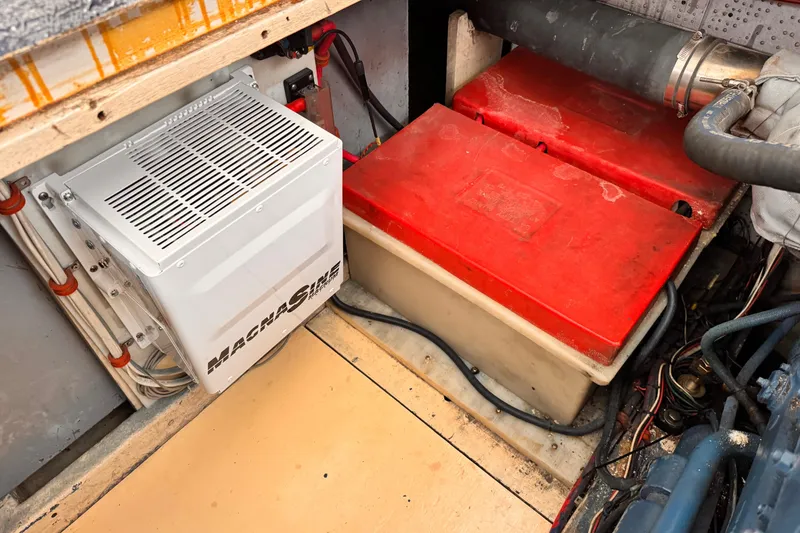 Electrical system in a 1978 Roughwater 41 boat, featuring a Magnum inverter and battery setup.