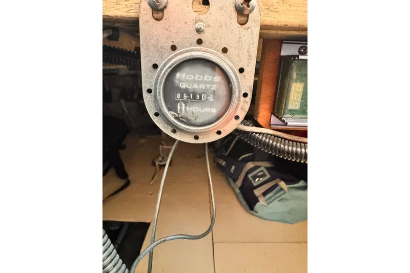 Hour meter on 1978 Roughwater 41 boat, displaying 5194 hours.