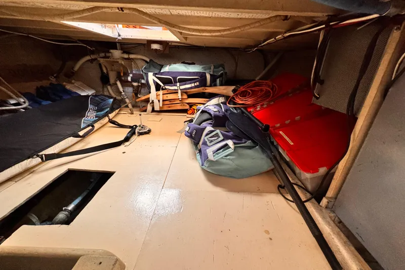Interior of 1978 Roughwater 41 boat with storage and equipment.