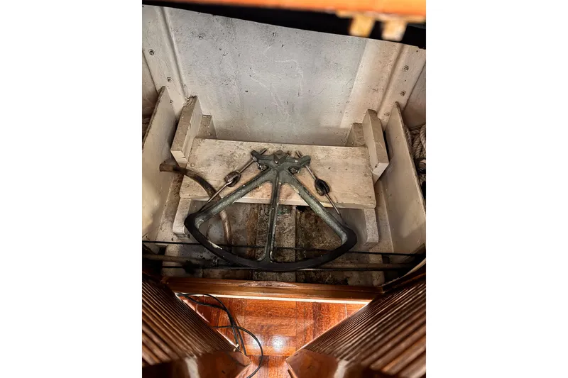 1978 Roughwater 41 boat interior showing anchor storage compartment.