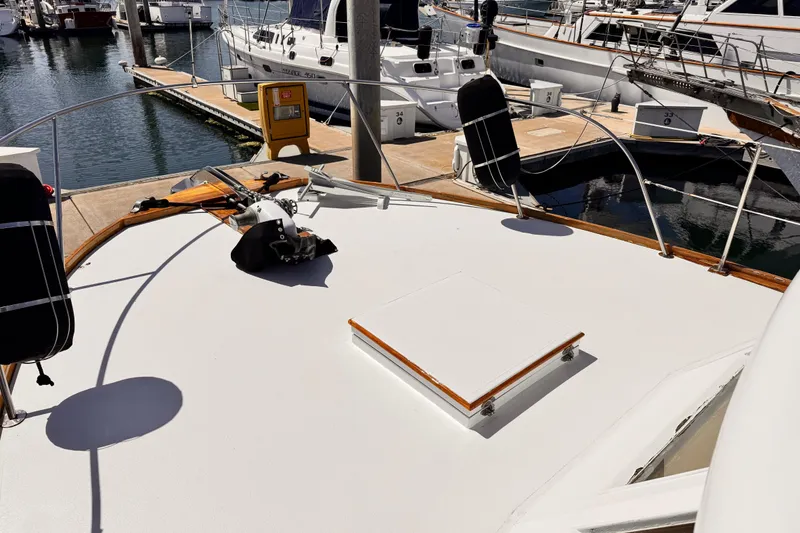 1978 Roughwater 41 yacht docked at marina, showcasing deck and railing.
