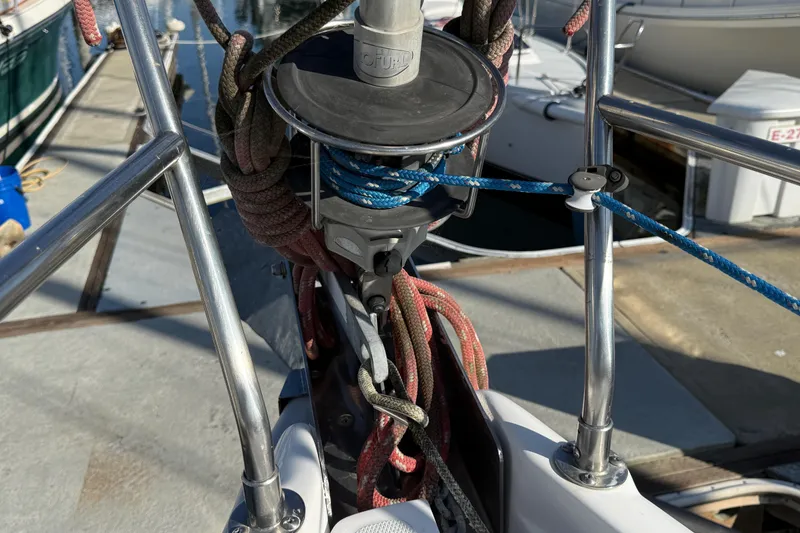 Close-up of rigging on a 1999 Hunter Passage 420 sailboat at a marina.