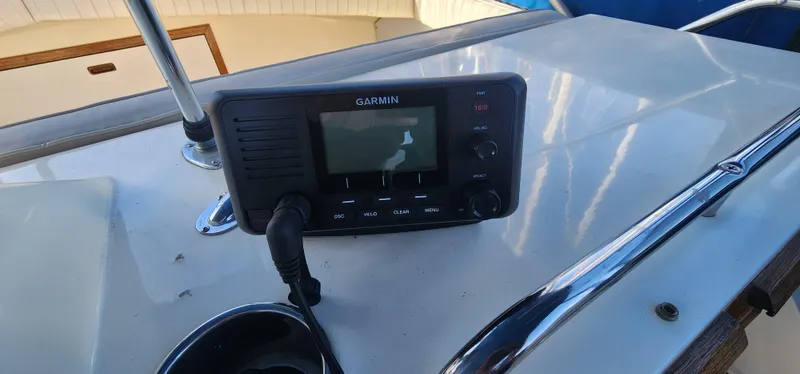 Garmin device on 1985 Bertram 33 Flybridge Cruiser dashboard.