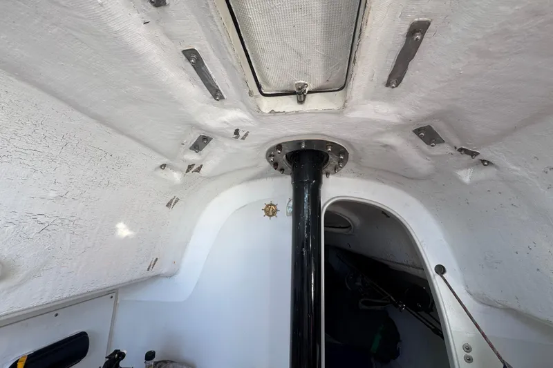 Interior view of a 2007 Flying Tiger 10M sailboat cabin ceiling and mast.