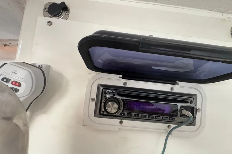 Kenwood stereo system in a 2007 Flying Tiger 10M boat cockpit.