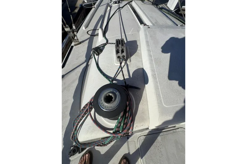 Deck of 2007 Flying Tiger 10M sailboat with winch and ropes.