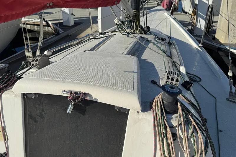 Deck of a 2007 Flying Tiger 10M sailboat with rigging and winches.