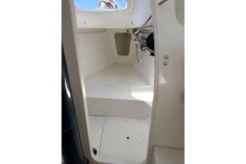 Interior view of a 2007 Flying Tiger 10M sailboat, showcasing clean white surfaces.
