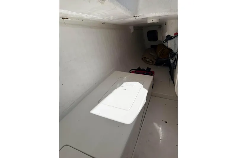 Interior cabin of a 2007 Flying Tiger 10M sailboat, featuring storage and equipment.