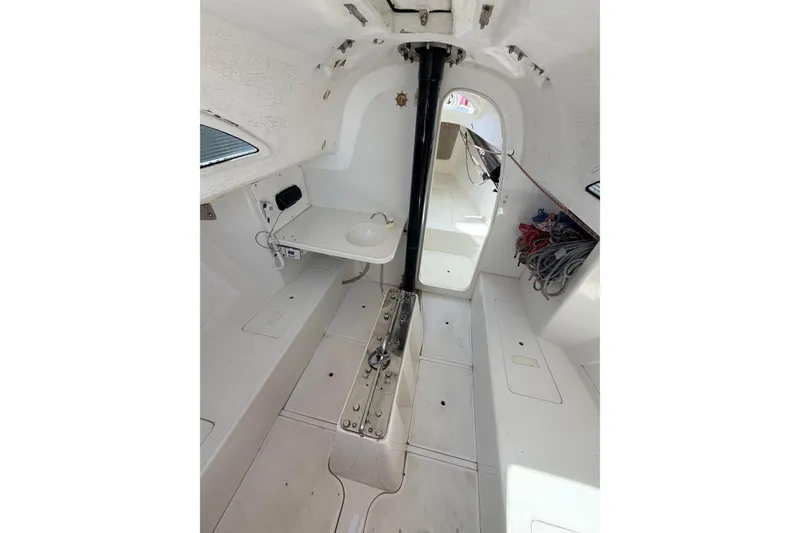 Interior of a 2007 Flying Tiger 10M sailboat, featuring a compact cabin layout.