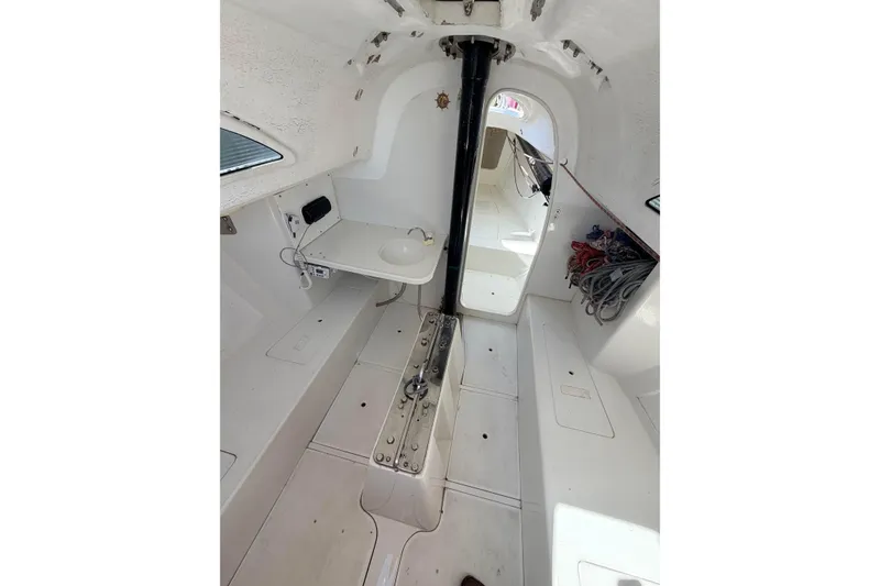 Interior of a 2007 Flying Tiger 10M sailboat, featuring a compact cabin layout.