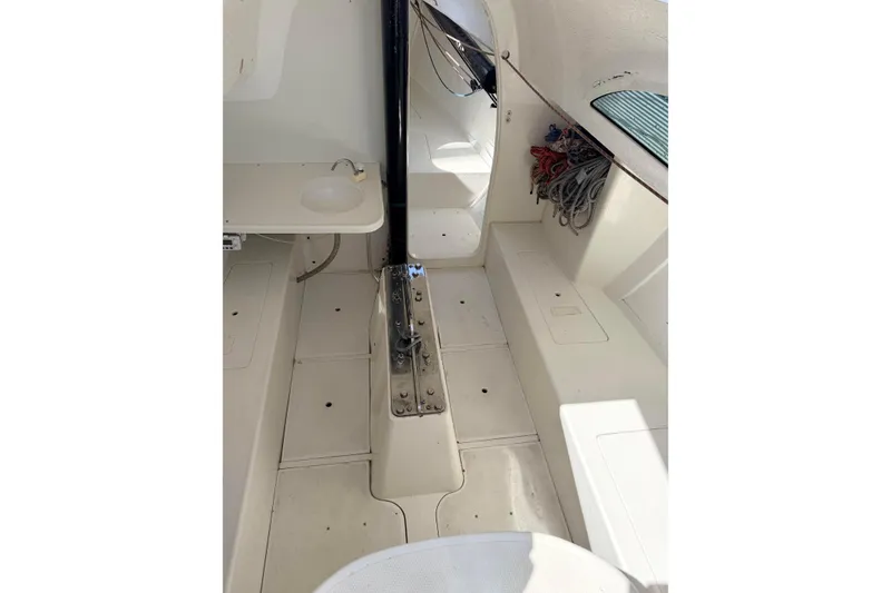 Interior of a 2007 Flying Tiger 10M sailboat, featuring a clean, white cabin space.