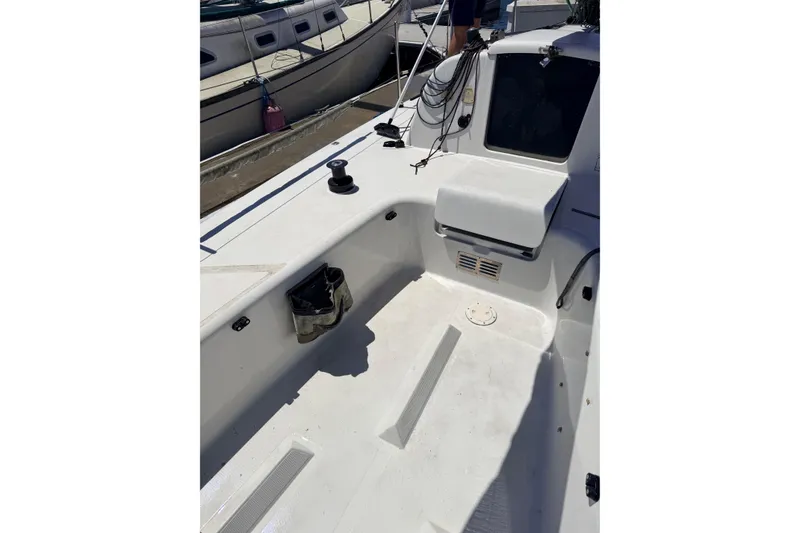 Cockpit of a 2007 Flying Tiger 10M sailboat, featuring winches and seating.