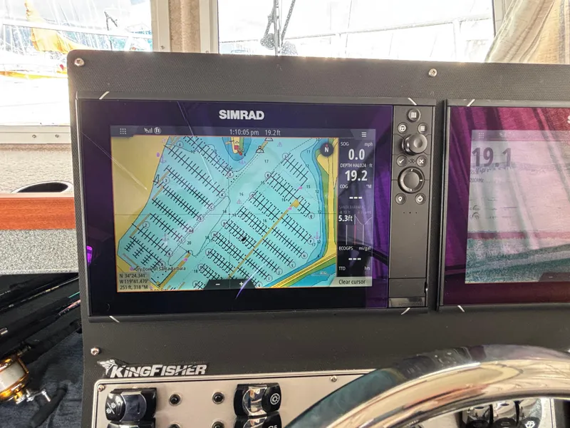Simrad navigation display on 2023 KingFisher 3025 Destination boat dashboard.