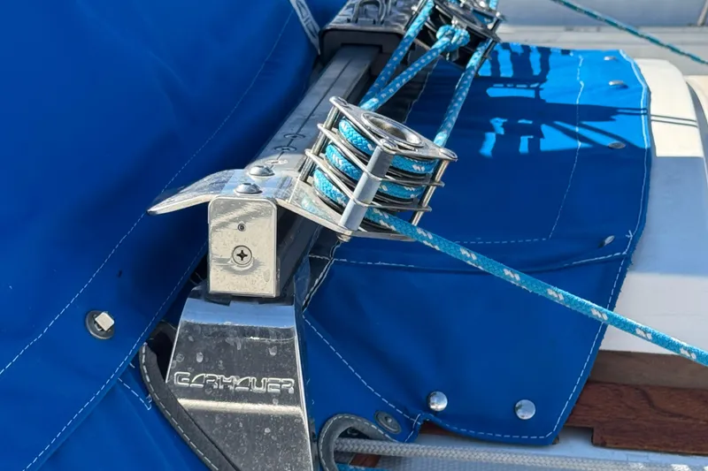 Close-up of Catalina 38 sailboat rigging with blue ropes and cover, 1985 model.