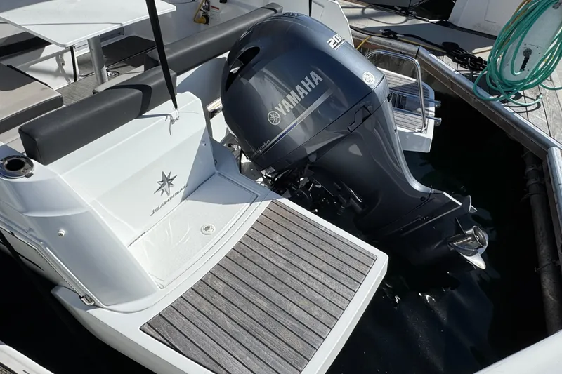 2020 Jeanneau NC 795 boat with Yamaha 200 outboard motor at dock.