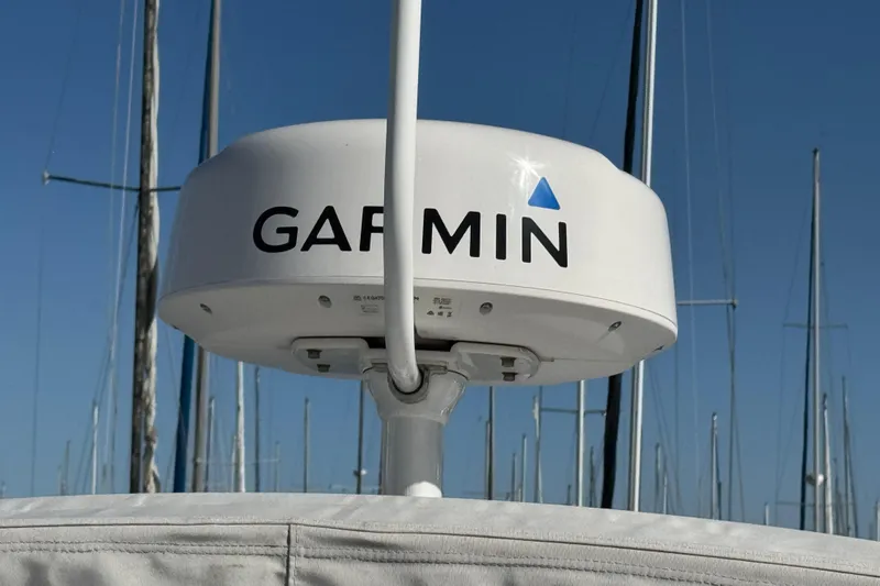 Garmin radar on Jeanneau NC 795 boat, 2020 model, with clear blue sky background.
