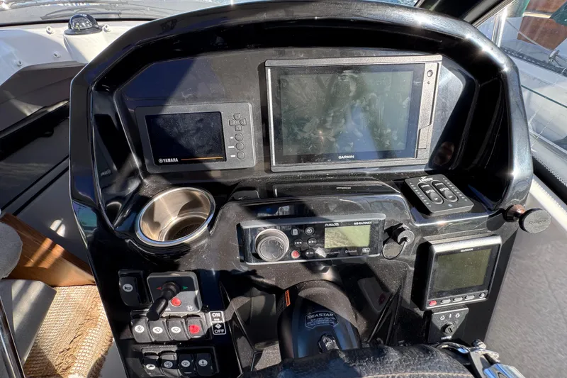 Cockpit of 2020 Jeanneau NC 795 with navigation and control systems.