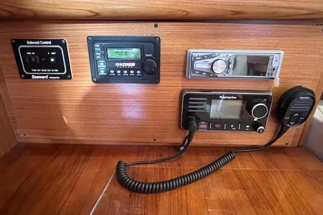 Control panel of a 2016 Catalina 385 sailboat with radio and navigation equipment.