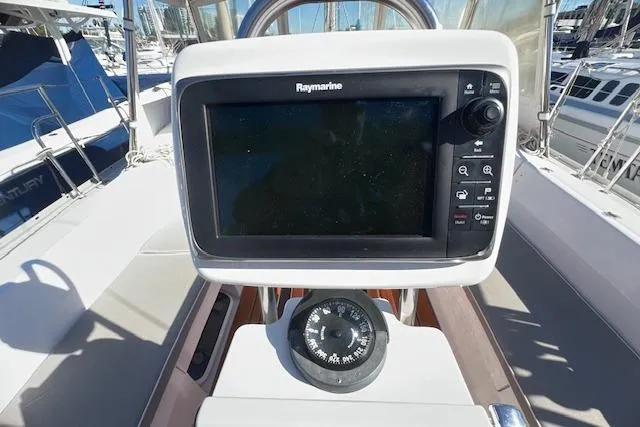 Cockpit of 2016 Catalina 385 sailboat with Raymarine navigation system and compass.
