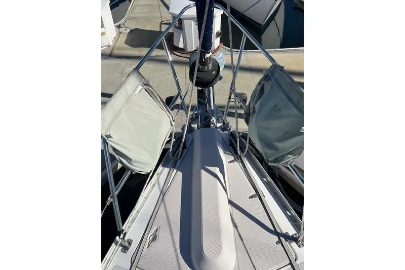 Bow of a 2016 Catalina 385 sailboat with deck details and railing.