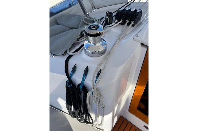 Sailing equipment on 2016 Catalina 385 yacht, featuring winch and ropes.
