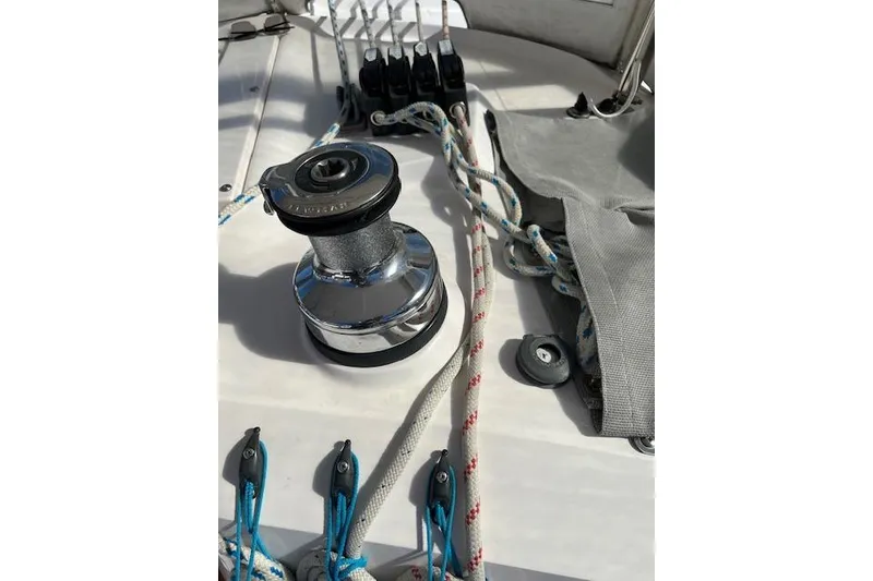 Deck of 2016 Catalina 385 sailboat with winch and ropes.